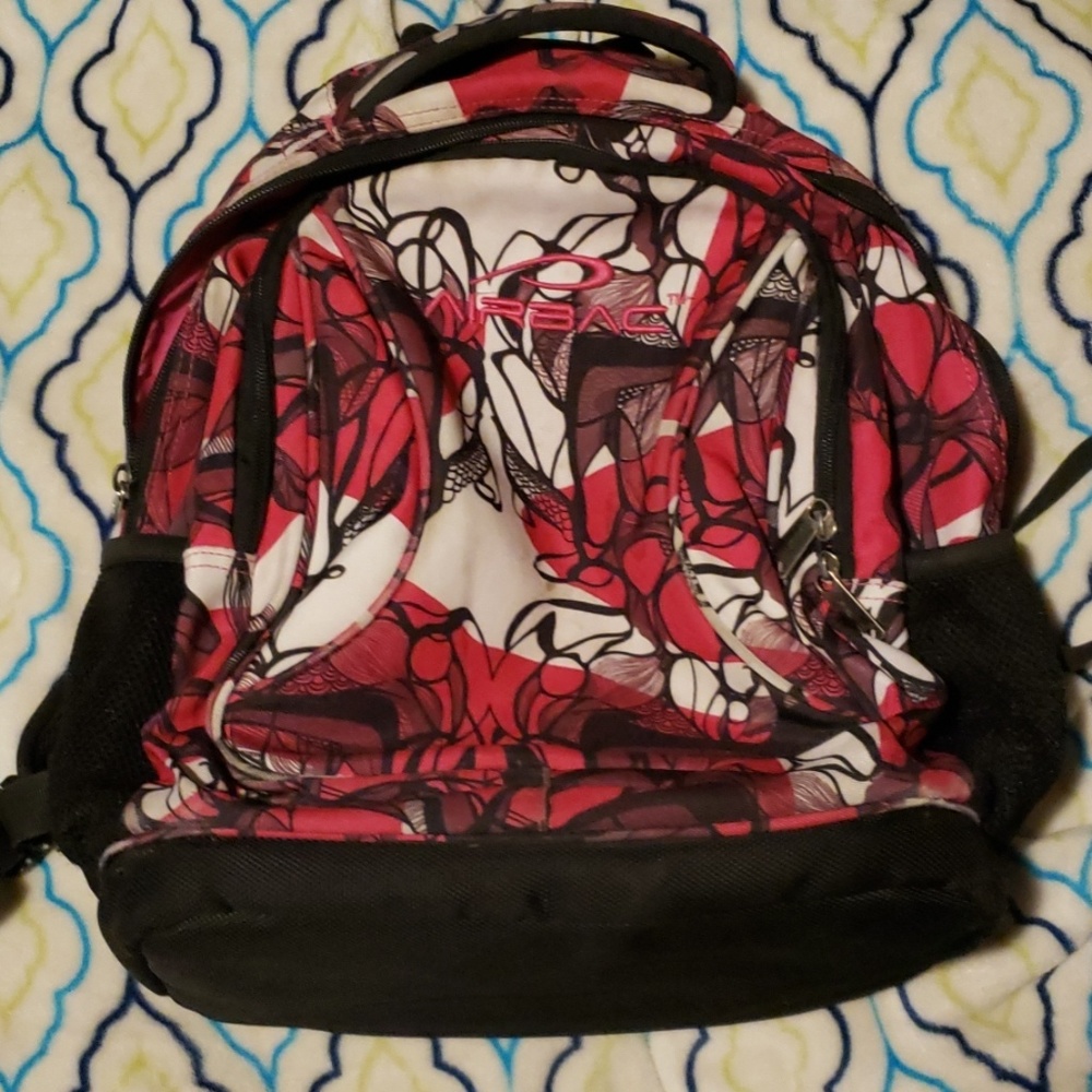 Airbac red and white print backpack